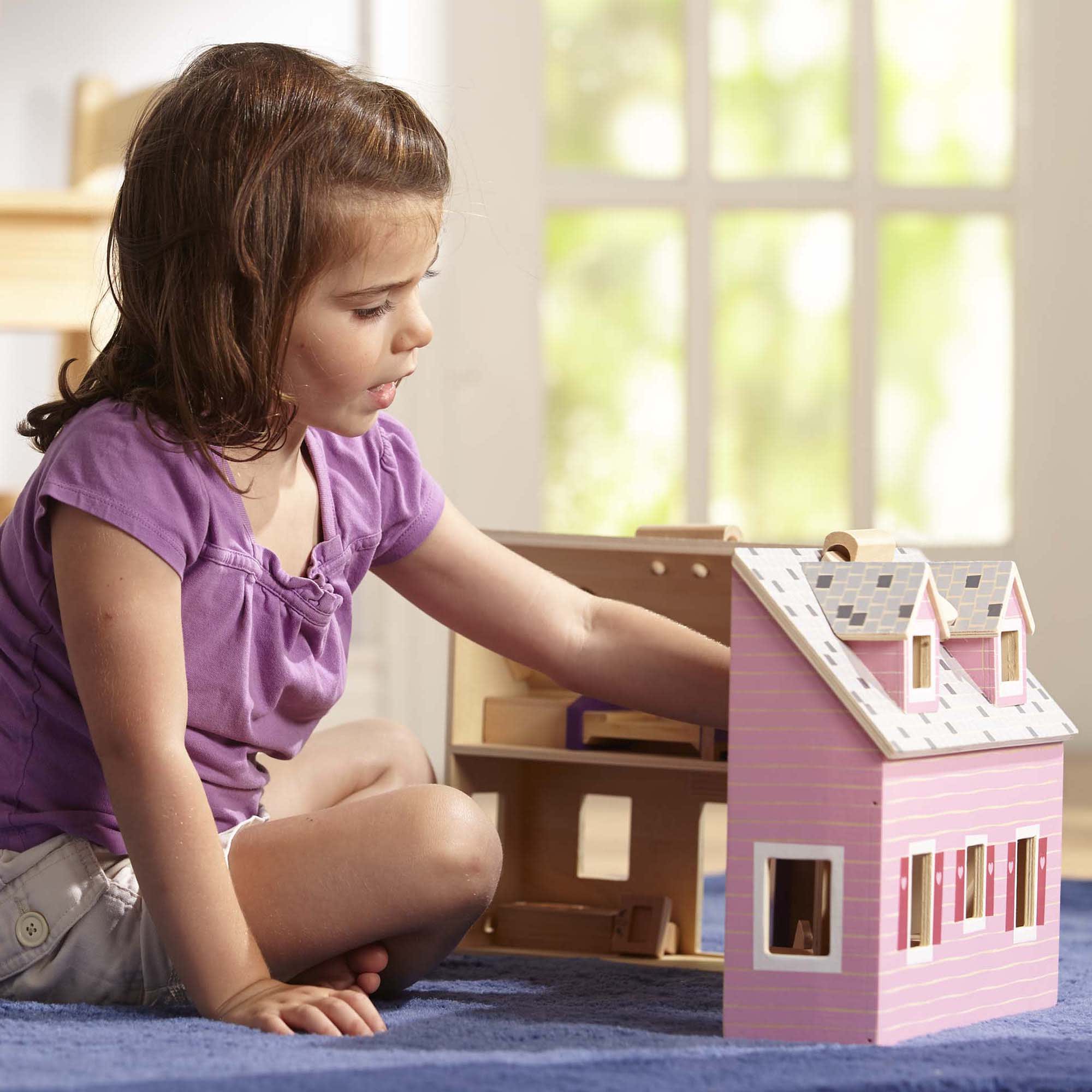 Melissa & doug fold deals & go dollhouse